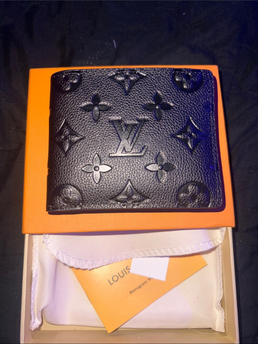Louis Vuitton Embossed monogram men’s wallet